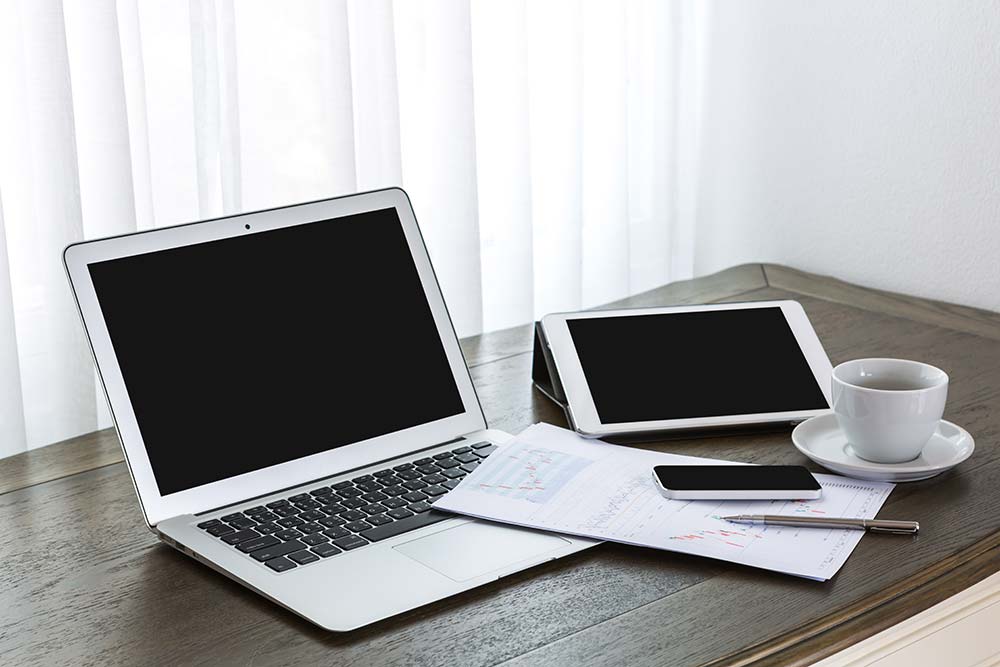 Laptop mobile and tablet at a designers workplace